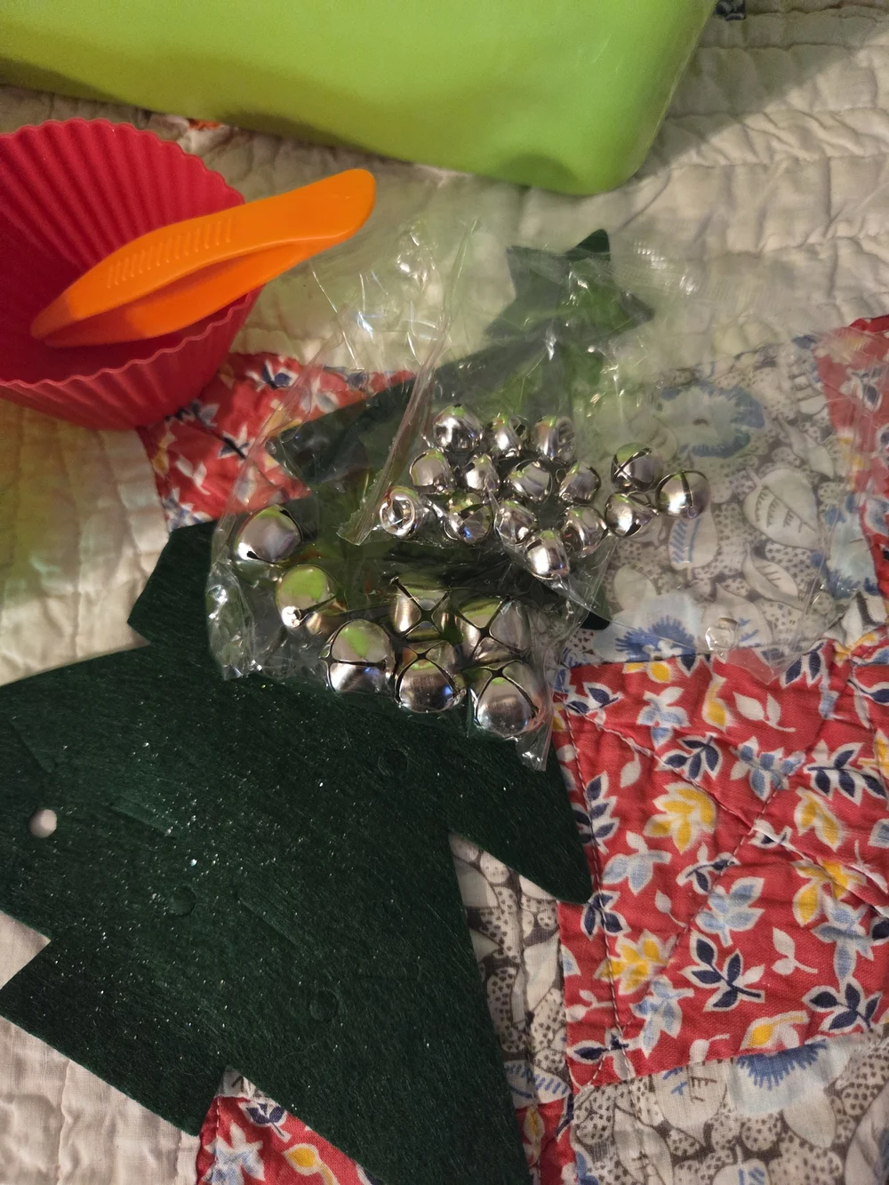 Fun bad of crinkle red paper & Christmas themed sensory bin add ins No Bin Inclu